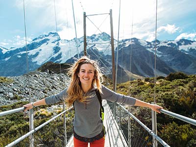 Young locum GP exploring Hooker Valley on New Zealand's South Island